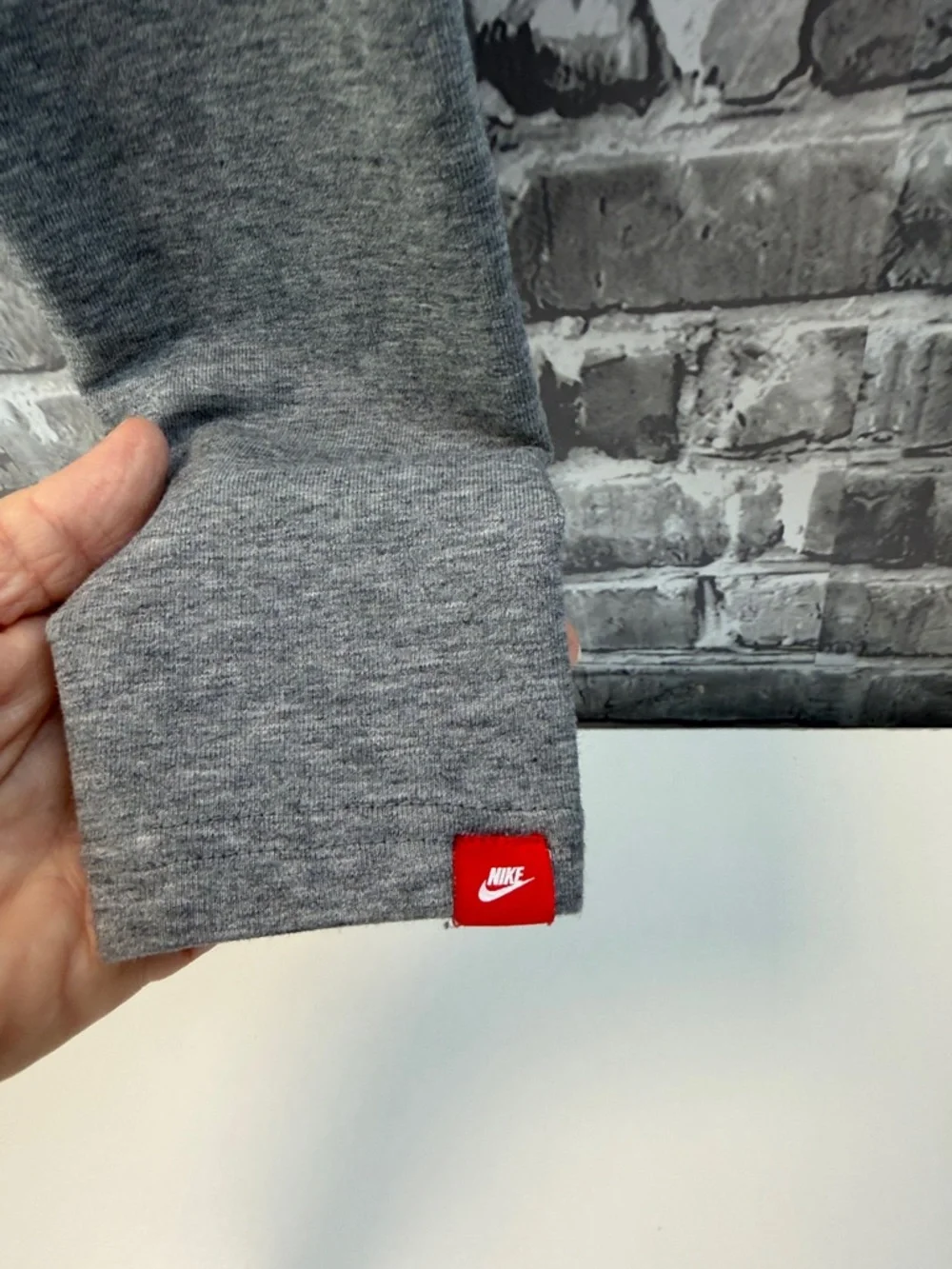 Nike Gray Athletic Leggings with Bold Black Graphic